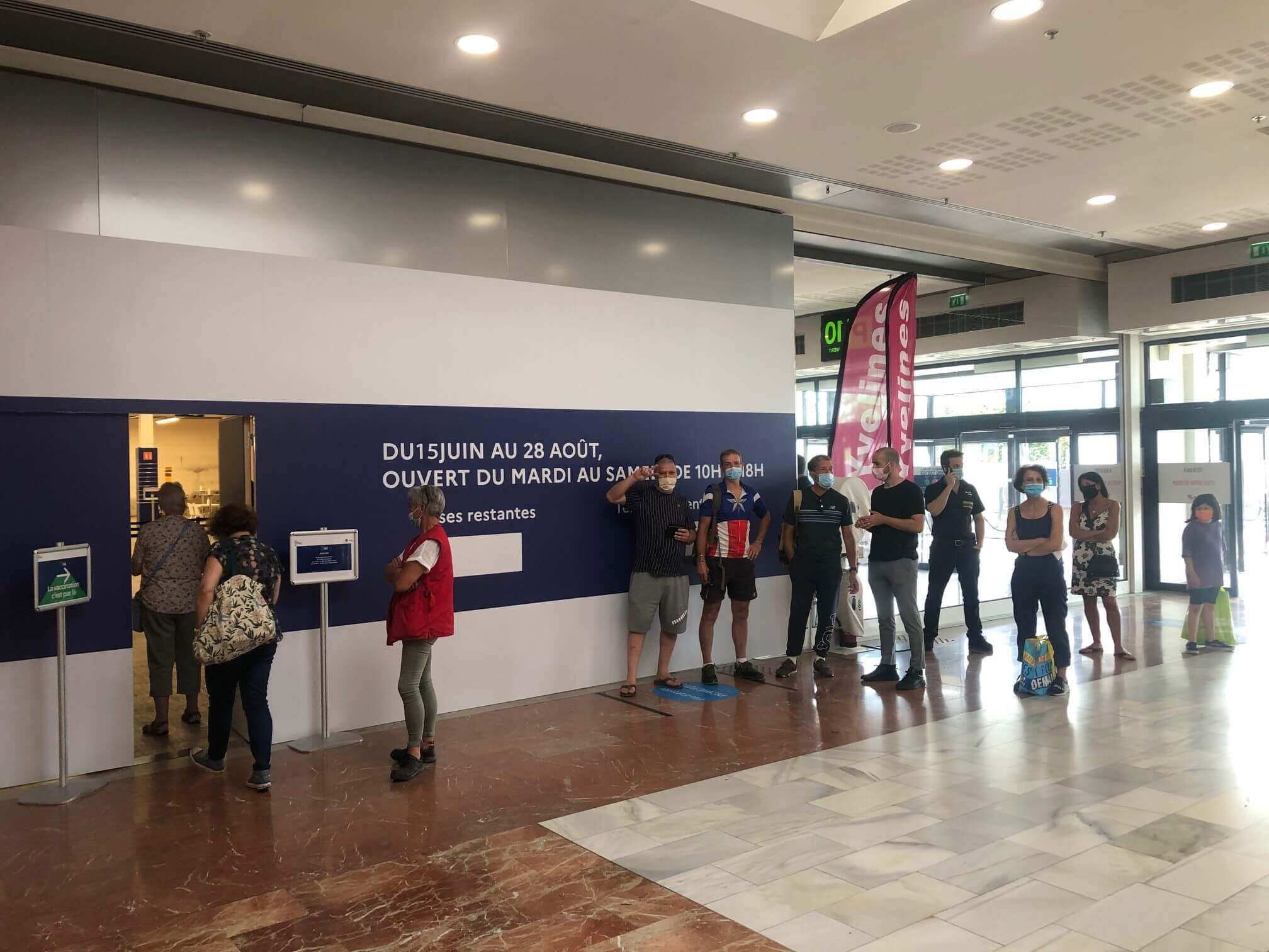 Visitors queue for vaccines at Vélizy 2 in France